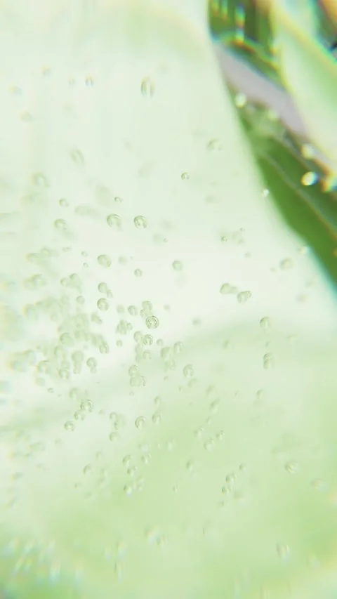 Cosmetics green serum liquid bubble 3d abstract background. Cosmetic moisturizer Stock Footage 344647924