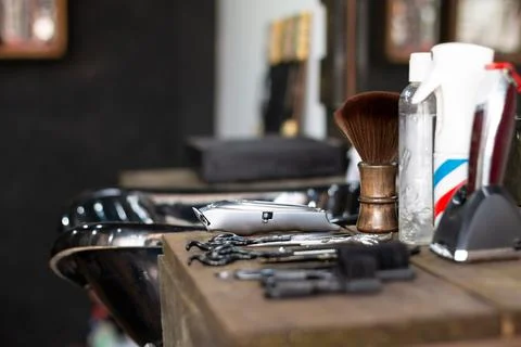 Cosmetics, objects and barber shop machines. Earth tones Stock Photos