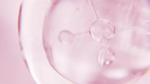 Cosmetics pink serum liquid bubble 3d abstract background. Cosmetic moisturizer Stock Footage 337998048