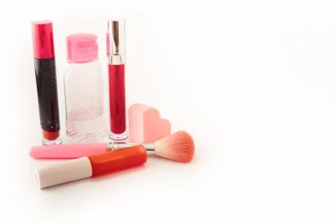 Cosmetics product make up, pink product make up on white background. Stock Photos