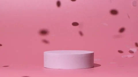 Cosmetics product mockup with confetti falling on pink background in slow motion Stock Footage 169560671