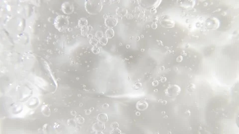 Cosmetics serum gel background, transparent cream texture, facial mask treatment Stockbeeldmateriaal 335886162