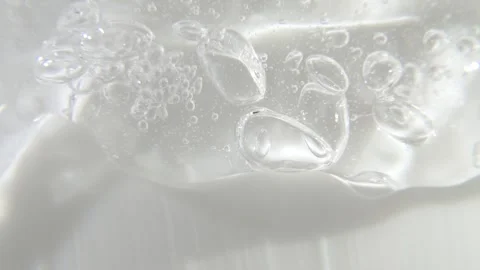 Cosmetics serum gel background, transparent cream texture, facial mask treatment Stock Footage 335886543
