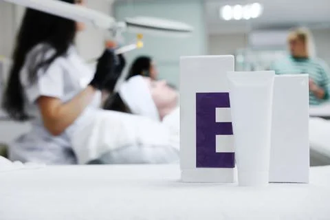 Cosmetics with vitamin E are on the table against the backdrop of the cosme.. Photos