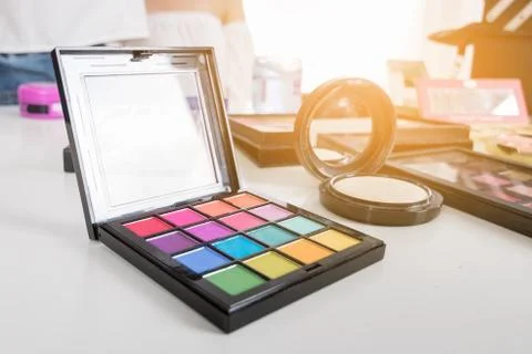 Cosmetin eye shadow on table in studio Stock Photos