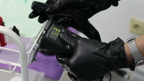 Cosmetologist checking equipment before making lips microblading tattoo Stock Footage 164588794