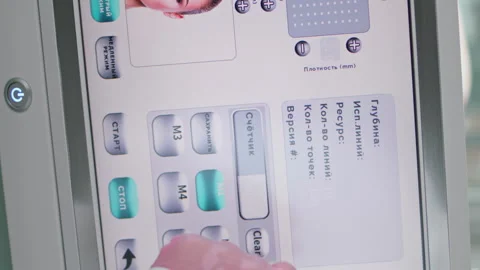 Cosmetologist hand adjusting laser vertically close up. Hand touching screen Stock Footage 269450938