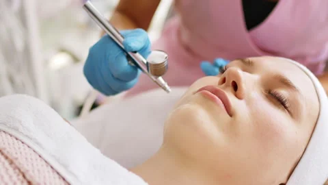 Cosmetologist makes procedure face non-injection oxygen mesotherapy Stock Footage 247449548