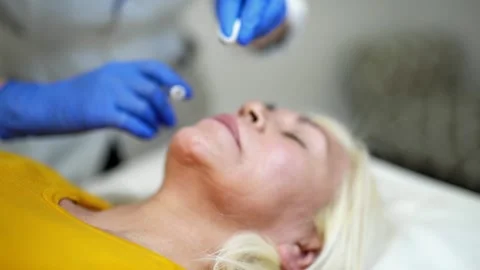 Cosmetologist making botox injection. Stock Footage 145695206