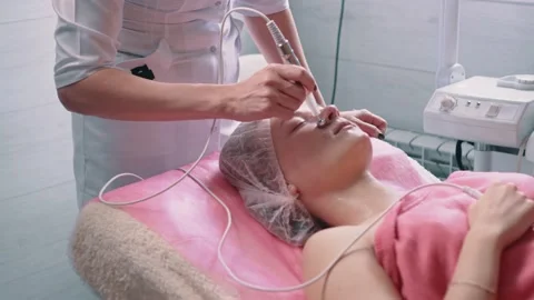 Cosmetologist making microcurrent therapy. Close up. Stock Footage 152143622