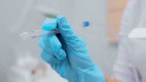 Cosmetologist performs a gas-liquid peeling procedure - rejuvenation and Stock Footage 230183269