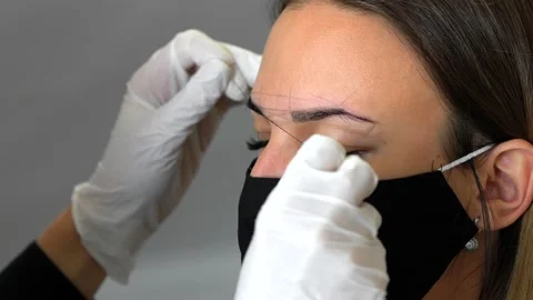 Cosmetologists' preparations for permanent eyebrow make up Stock Footage 149050629
