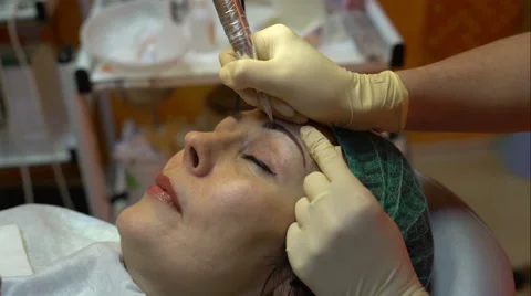 Cosmetology. Permanent makeup eyebrows Stock-Footage 62330224
