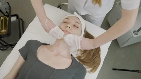 Cosmetology session showcasing permanent makeup application for a girl Video stock 314256714