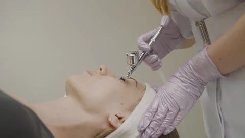 Cosmetology session showcasing slow motion application of permanent makeup Stock-Footage 319827282