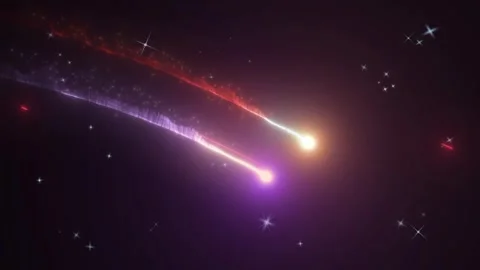 Cosmic comets trailing glowing red and purple light streaks across deep dark Video stock 345333423