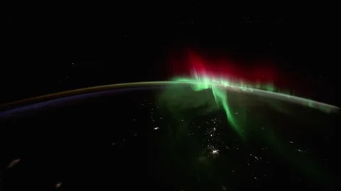 Cosmic Light Show: Earth's Spin with Green-Red Aurora Borealis Stock Footage 305656983