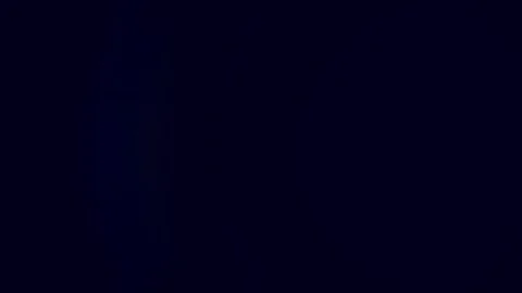 Cosmic radiance a celestial sphere of brilliant light radiates from the darkness Stock Footage 313558517