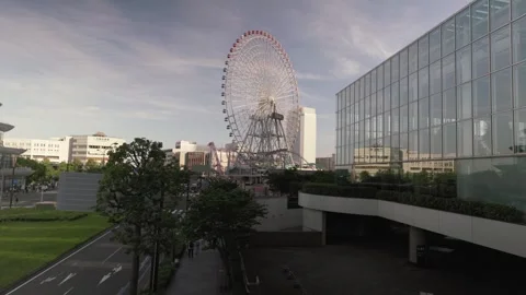 Cosmo Clock 21 Ferris Wheel At The Yokohama Cosmoworld Amusement Park In Stock Footage 342186386