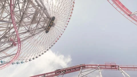 Cosmo Clock 21 Ferris Wheel And Vanish! Diving Coaster - Yokohama Cosmo World - Stock Footage 344092399