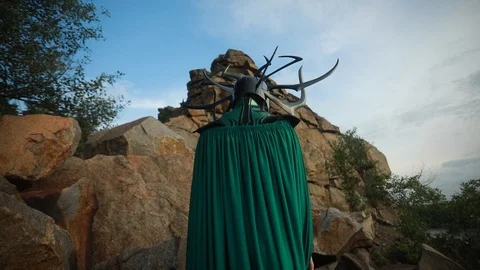 Cosplayer portrays goddess Hela in cloak. Stock Footage 115039645
