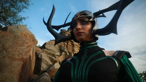 Cosplayer portrays goddess Hela with sword. Stock Footage 115039612