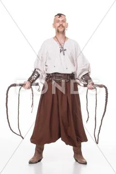 Cossack in trousers on white background with Batog Stock Photos