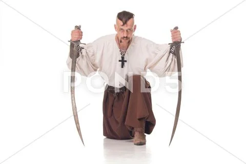 Cossack in trousers on white background with sabers Stock Photos