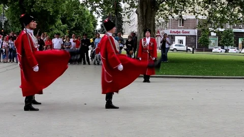 Cossacks in red Circassian coats and black papakhs a solemn march Stock Footage 75450520