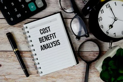 Cost Benefit Analysis (CBA) text on notepad, Business and Financial concept.. Stock Photos