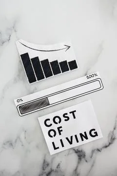 Cost of living going down, text with graph showing stats decreasing and pro.. 写真素材