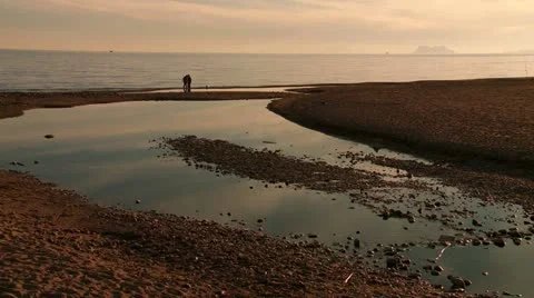Costa del sol beach as sunset approaches, Estepona, 動画素材 19443727