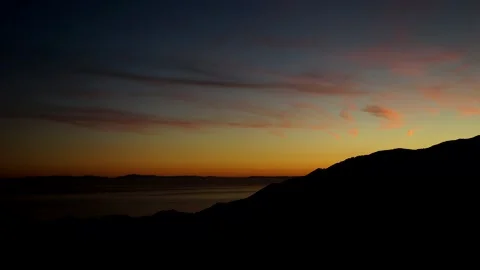 Costa del Sol Sunset behind mountain with view of ocean and morocco Stock Footage 146258371