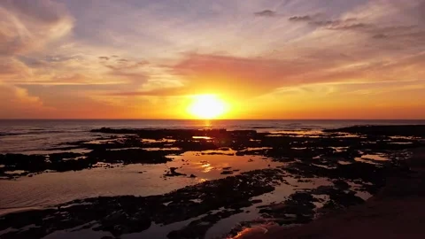 Costa Rica, natural pools while low tide with sunset Stock Footage