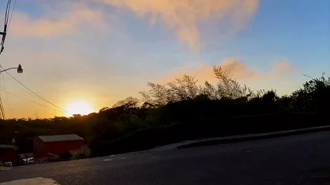 Costa Rica, time lapse clouds flying by while sunset 動画素材 152176340