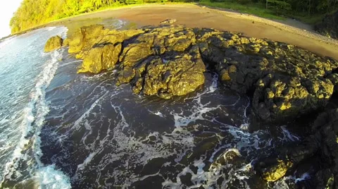 Costa Rican River, Ocean and Rocks Aerial Stock Footage 34397181