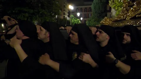 Costaleros Carrying Religious Float During Holy Week in Malaga Stock Footage 336007594