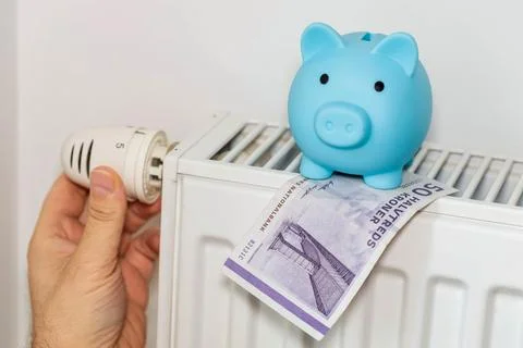 Costs of heating apartments in winter in Denmark, Energy and economic  Stock Photos