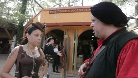 Costumed Performers Talking Outside Renaissance Fair Shop Stock Footage 345279274