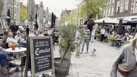 Costumed Stilt Walker Among Crowds at Chocolate Festival Zutphen in Netherlands Stock Footage 346556751