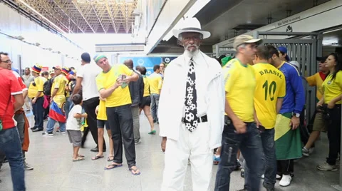 Costumed supporter looking to the camera before Brazil x Croatia Stock Footage 39598404