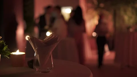 Cosy served table in the restaurant with active waiters and employees Stock Footage 245003488