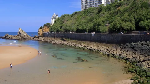Cote des Basques beach at low tide during a sunny day of summer in Biarritz Stock Footage 157869724