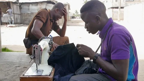 Cotonou street tailor Stock Footage 81091125