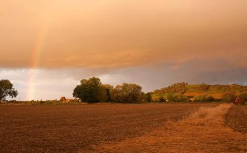 Cotswolds countryside with dramatic sunset Stock Photos