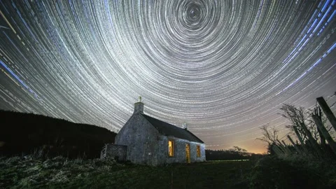 A cottage and some star trails Stock Footage 148394959