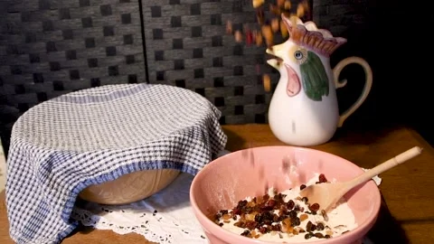 Cottage  baking  currants  sprinkling  in to  bowle Stock Footage 270536225