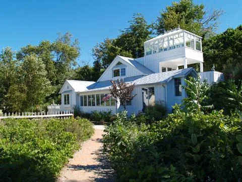 Cottage on the Beach Stock Photos