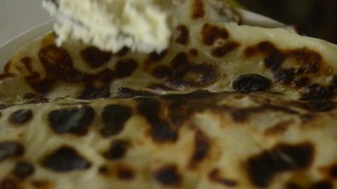 Cottage cheese been putted on the pan cake Видео 137883296