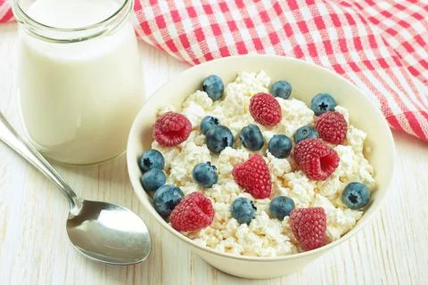 Cottage cheese with berries Stock Photos